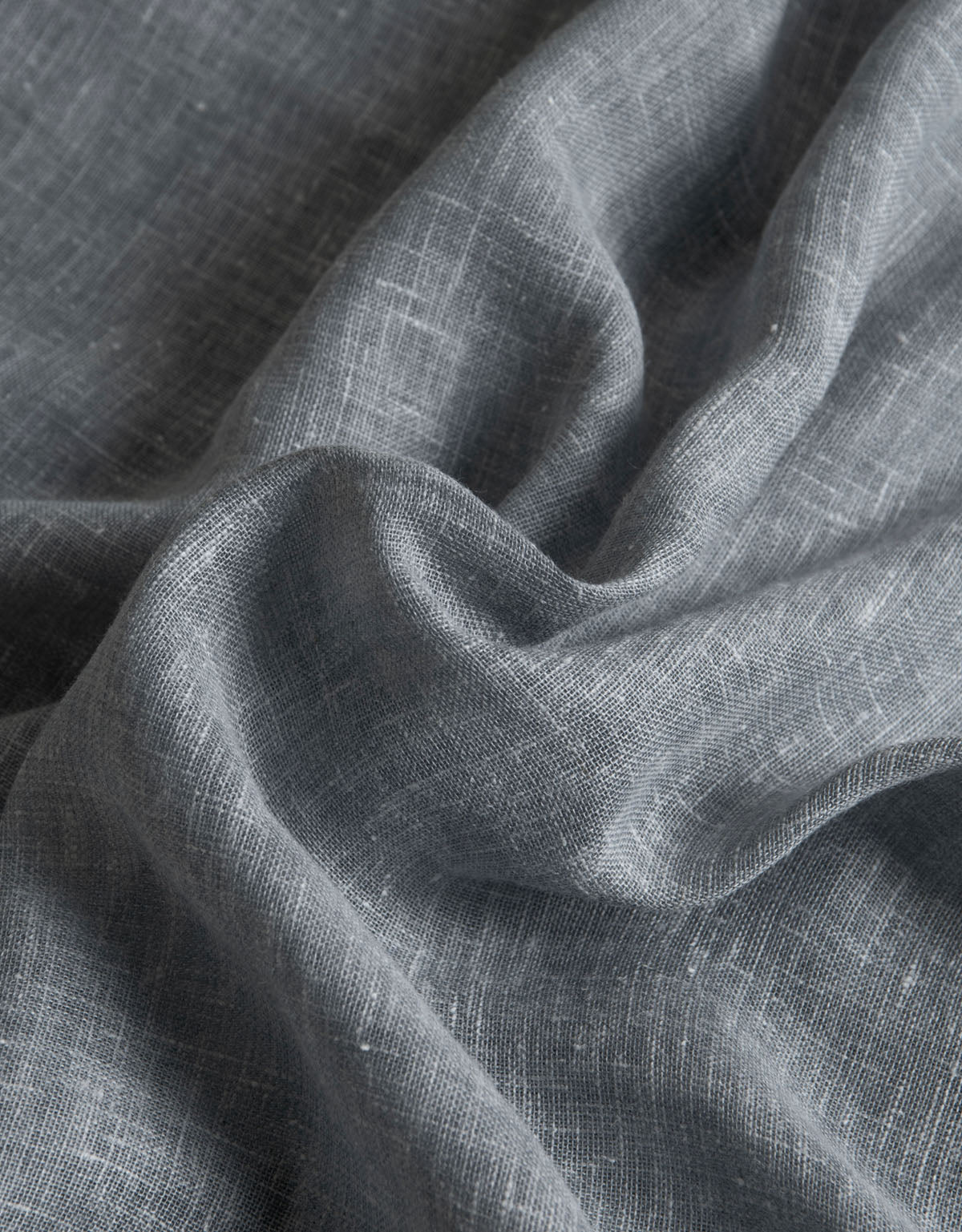 Close-up of blue curtain fabric in a linen blend