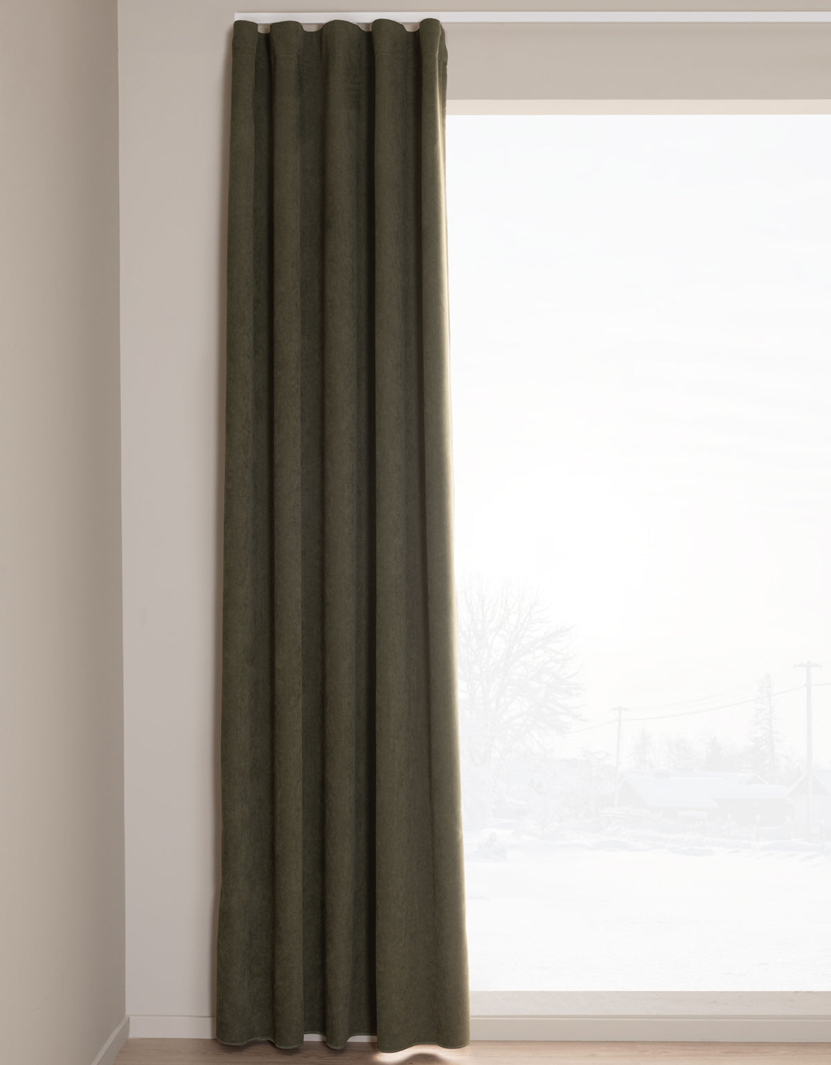 Green room-darkening curtain